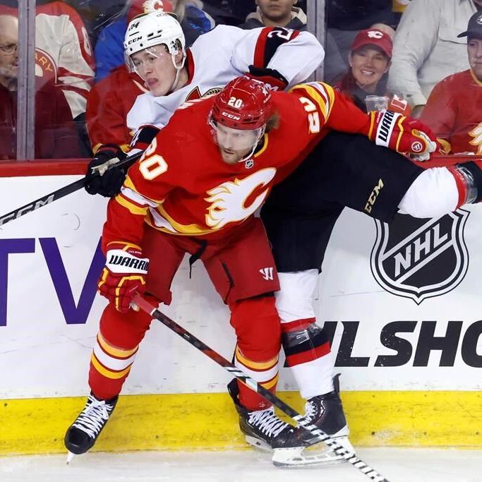 Flames catch fire in third period, burn Senators 6-3